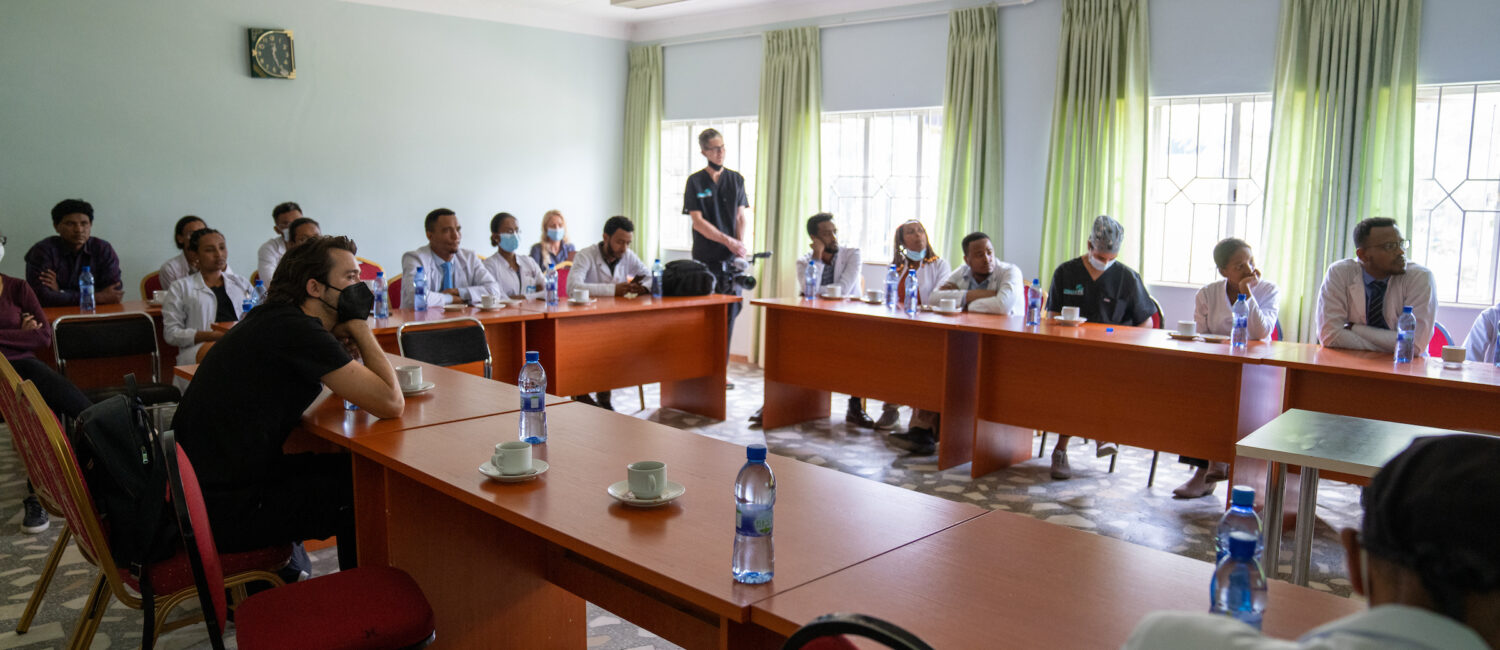 A group of medical professionals having a conference.